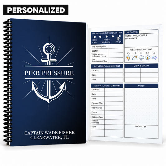 Personalized navy Captain’s Logbook with white anchor, custom boat and captain names, black spiral binding, and guided boating log page.